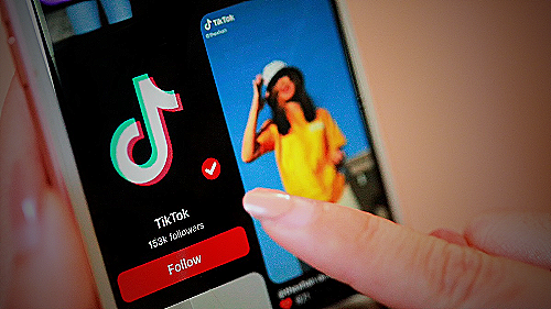 A person creating Tiktok content - how to start an onlyfans without followers